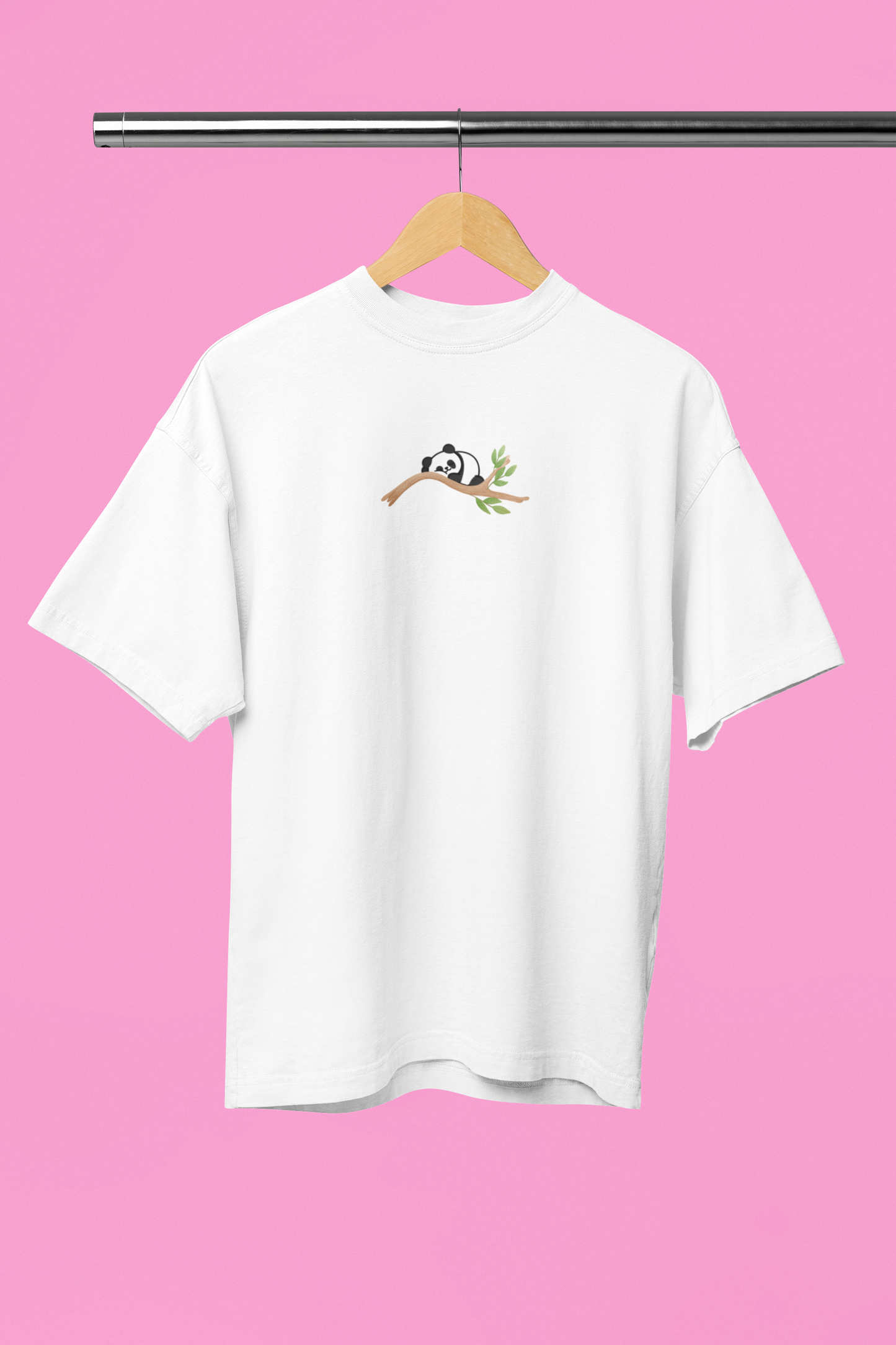 Lazy bear sleeping on a branch Oversized t-shirt in white
