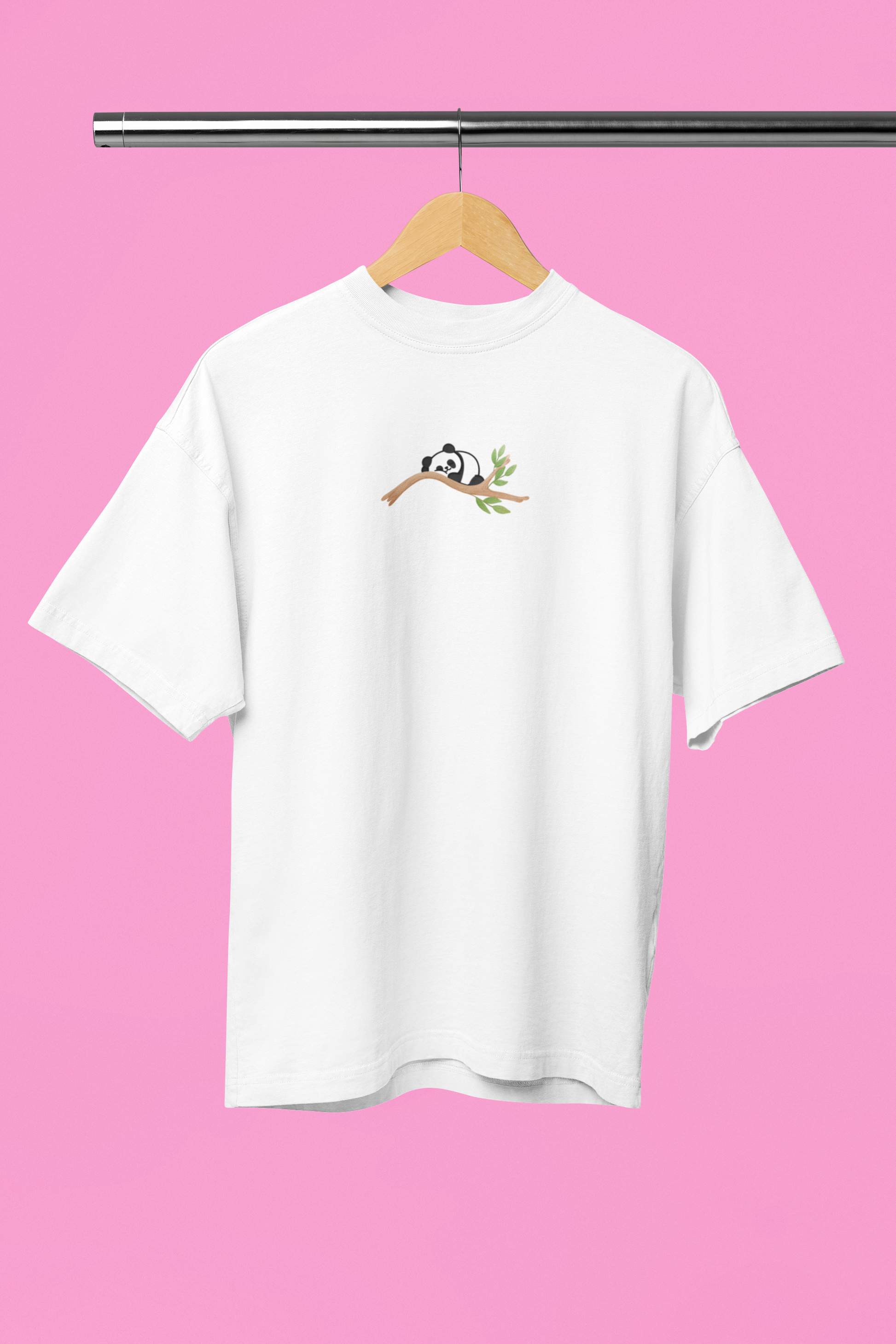 Lazy bear sleeping on a branch Oversized t-shirt in white